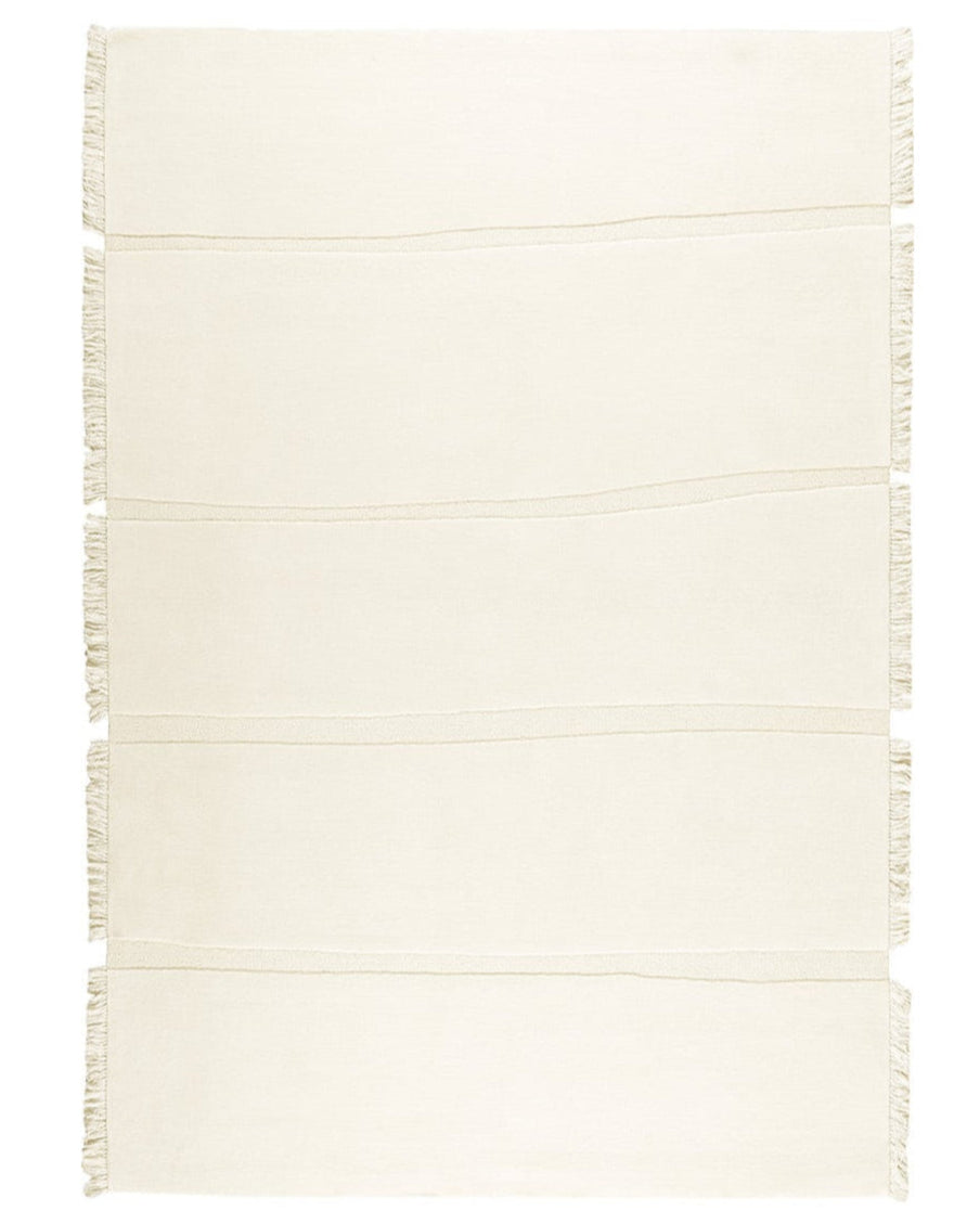 White woven rug with fringe on a white background