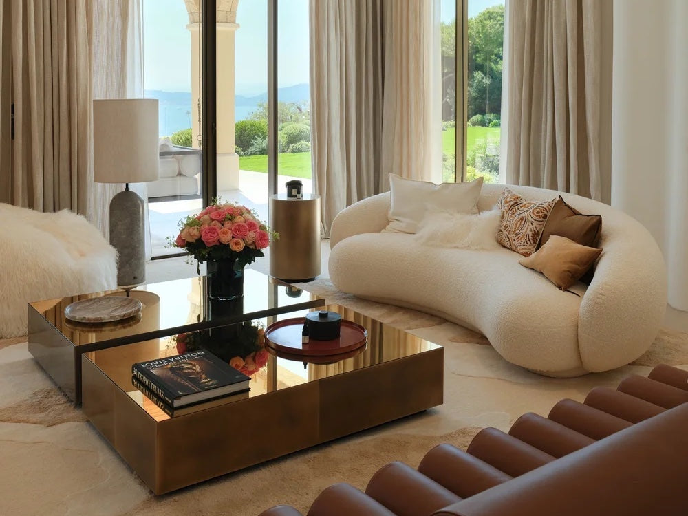 Luxurious Massimo Copenhagen living room with modern sofa, gold coffee table, and handcrafted rug